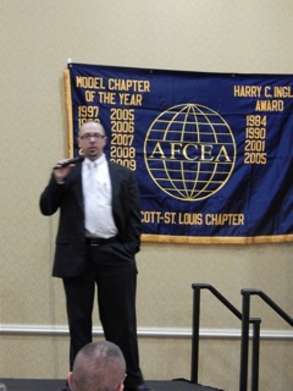 Kristopher Bleich, director of forensic services for Speartip, addresses the chapter in October.